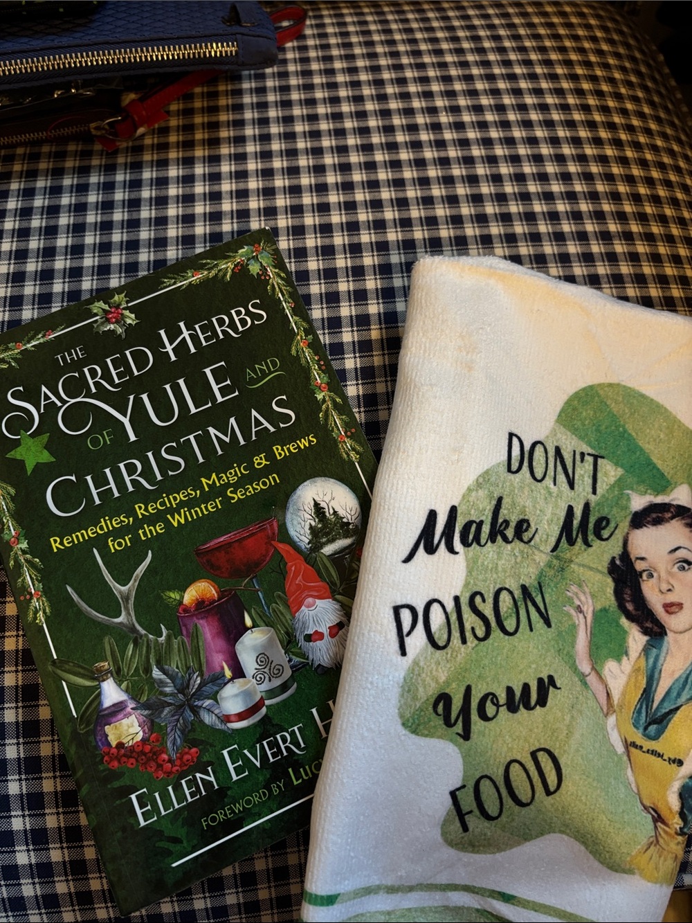 The Sacred Herbs of Yule and Christmas cookbook with humorous dish towel